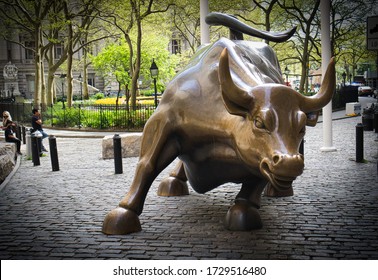 New York, NY / USA - May 2 2020:  Wall Street Stock Exchange Charging Metal Bull In NYC Manhattan Lower Financial District