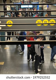 New York, NY  USA - May 17, 2021: New York City, Commuters On Crowded Subway Platform During Final Months Of Covid-19 Pandemic Crisis