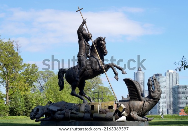 New York,\
NY, USA - May 15, 2022:\'Good Defeats Evil\', sculpture by Zurab\
Tsereteli, commemorates the 1987 signing of INF Treaty, located on\
the grounds of the UN Gift\
Garden