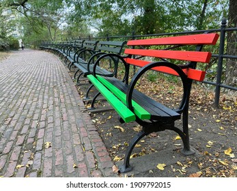New York, NY, USA – October 11, 2020: A bench in Washington Heights painted in the colors of the Pan-African flag