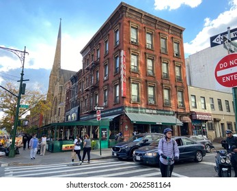 New York, NY USA - October 22, 2021: A View Of People, The Restaurant Harlem Shake And A Church On Historic Lenox Avenue In Harlem