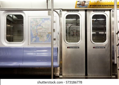 New York, NY, USA - September 6, 2016: Inside of New York Subway: Seats and inside of empty car: The NYC Subway is one of the oldest and most extensive public transportation systems in the world.