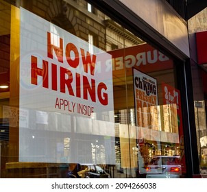 New York NY USA-December 17, 2021 A sign on the window of a Burger King restaurant in New York announces that they are hiring