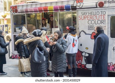 New York NY USA-January 21, 2016 Millennials line up in the cold at the brand activation of the collaboration between CotyÕs OPI nail lacquer and Sanrio's Hello Kitty character
