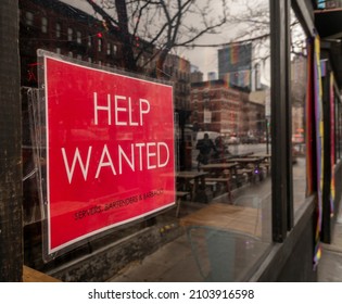 New York NY USA-January 9, 2022 Help Wanted Sign In A Restaurant Window In HellÕs Kitchen In New York
