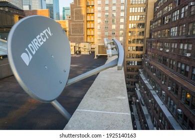 New York NY USA-July 21, 2016 A DirecTV Satellite Dish On The Rooftop Of A Building In New York