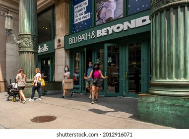 New York NY USA-July 22, 2021 Customers exit the newly reopened Bed Bath and Beyond store in Chelsea New York on reopening day