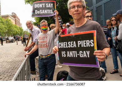 New York NY USA-June 12, 2022 Members of the LGBTQ+ community and supporters protest FL Gov Ron DeSantisÕ speaking at a conservative Jewish Conference organized by  the Tikvah Fund, at Chelsea Piers
