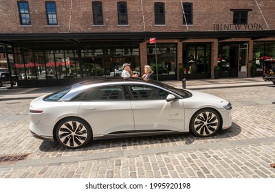 New York NY USA-June 23, 2021 A Lucid Air displayed outside the newly opened flagship studio of Lucid Motors in the Meatpacking District in New York