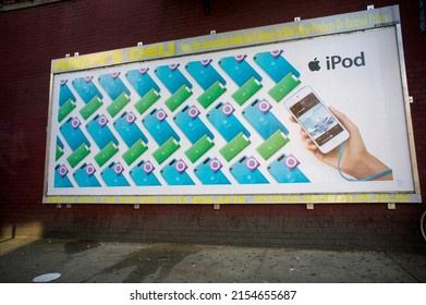 New York NY USA-November 11, 2012 Advertising for the Apple's line of iPods on a billboard in the Chelsea neighborhood of New York