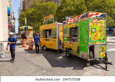 New York, NYC, USA - August 26, 2017: Street Food Colorful Vendor Cart In State Street, Downtown Manhattan, Near Battery Park.