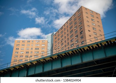 New York NY/USA-April 27, 2019 Manhattanville Housing Project In Harlem In New York With The IRT Elevated Subway