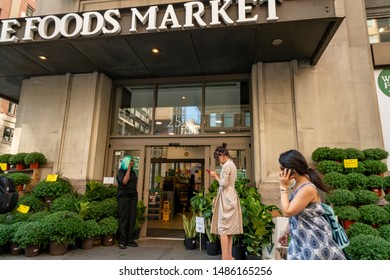 New York NY/USA-August 22, 2019 Shoppers Outside Of Whole Foods Market In The Chelsea Neighborhood Of New York