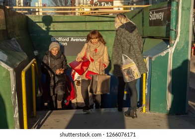 New York NY/USA-December 23, 2018 Residents And Visitors Enter And Leave The Bedford Avenue Station On The 