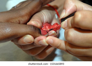 New York NY/USA-July 9, 2008 Nail Polish Is Applied To A WomanÕs Hand In A Nail Salon In New York