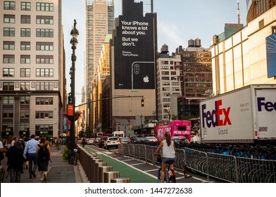 New York NY/USA-July 9, 2019 A Billboard On The Side Of A Building In Midtown Manhattan Informs Viewers Of The Privacy Afforded By Using Apple Devices. 