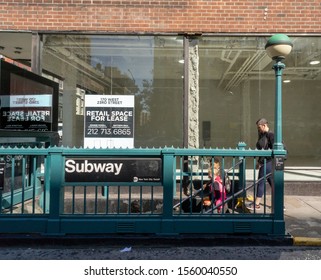 New York NY/USA-June 11, 2018 Commuters Enter The Subway In Front Of Retail Space, Recently Vacated By A Nail Salon, In The Chelsea Neighborhood Of New York