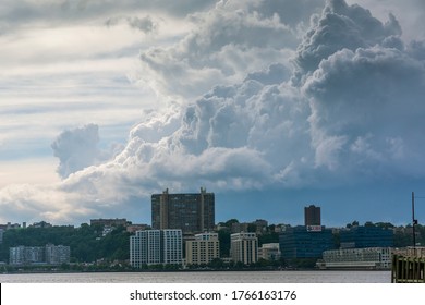 New York NY/USA-June 27, 2020 Clouds Above Hoboken, New Jersey Seen From Hudson River Park In New York