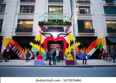 New York NY/USA-November 25, 2011 Shoppers View The Barney's Christmas Window Display, Gaga's Workshop Featuring Lady Gaga On Madison Avenue In New York