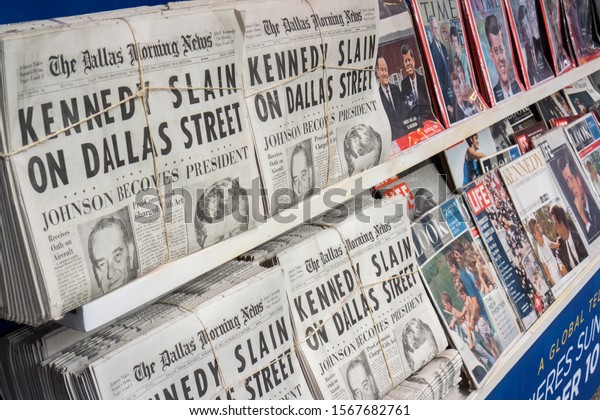 New York NY/USA-November 6,\
2013 A 1960\'s era newsstand, complete with 1963 newspapers and\
magazines for the National Geographic Channel\'s program \