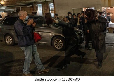 NEW YORK, NEW YORK - OCTOBER 10: Orthodox Jewish Men Confront A Reporter At The Borough Park Neighborhood Of Brooklyn On October 10, 2020 In New York City.