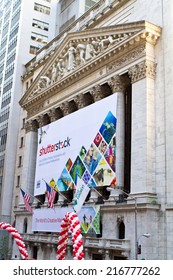 NEW YORK - OCTOBER 17, 2014:  Shutterstock Banner Displayed In Front Of The New York Stock Exchange On The Day Of The Bell Ringing Ceremony To Start Trading Under The Ticker SSTK.