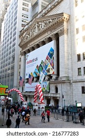 NEW YORK - OCTOBER 17, 2014:  Shutterstock Banner Displayed In Front Of The New York Stock Exchange On The Day Of The Bell Ringing Ceremony To Start Trading Under The Ticker SSTK.