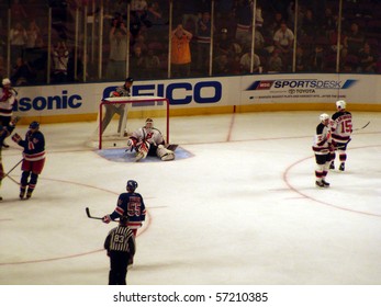 NEW YORK - OCTOBER 2: The Rangers Score A Goal On Devils Goalie Martin Brodeur  In A Preseason Game At Madison Square Garden October 2, 2005 In New York, NY.