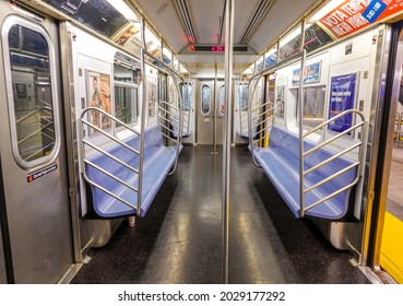 NEW YORK - OCTOBER 22, 2019: Inside Of NYC Subway Car At 34 Street - Hudson Yards Station In Manhattan. Owned By The NYC Transit Authority, The Subway System Has 469 Stations In Operation