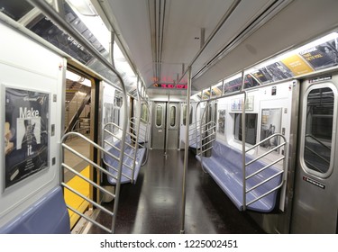 NEW YORK - OCTOBER 25, 2018: Inside Of NYC Subway Car At 34 Street - Hudson Yards Station In Manhattan. Owned By The NYC Transit Authority, The Subway System Has 469 Stations In Operation