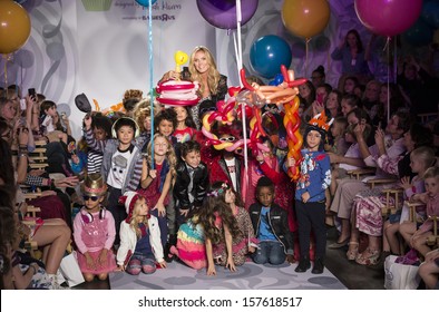 NEW YORK - OCTOBER 5: Heidi Klum And Models Pose At The Truly Scrumptious Designed By Heidi Klum At Vogue Bambini - Petite Parade Kids Fashion Week On OCTOBER 5, 2013 In New York