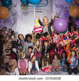 NEW YORK - OCTOBER 5: Heidi Klum And Models Pose At The Truly Scrumptious Designed By Heidi Klum At Vogue Bambini - Petite Parade Kids Fashion Week On OCTOBER 5, 2013 In New York