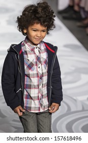 NEW YORK - OCTOBER 5: A Model Walks The Runway At The Truly Scrumptious Designed By Heidi Klum At Vogue Bambini - Petite Parade Kids Fashion Week On OCTOBER 5, 2013 In New York