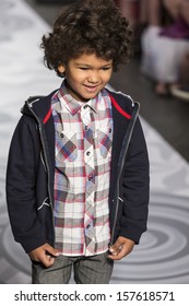 NEW YORK - OCTOBER 5: A Model Walks The Runway At The Truly Scrumptious Designed By Heidi Klum At Vogue Bambini - Petite Parade Kids Fashion Week On OCTOBER 5, 2013 In New York