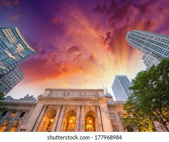 New York Public Library Exterior With Trees And Surrounding Buildings.