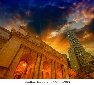 The New York Public Library. Side View With Surrounding Buildings And Dramatic Sky.