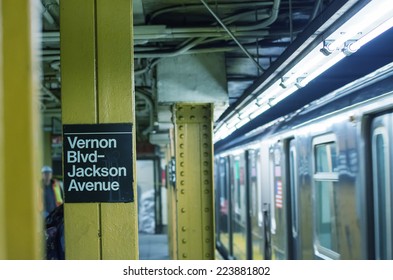 New York - Queens Subway Station With Train Stopping.