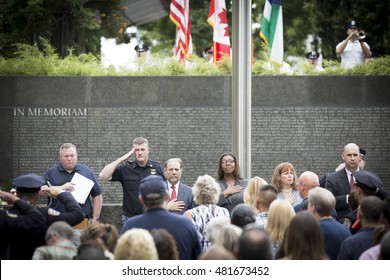 NEW YORK - SEPT 9 2016: A Police Officer Plays Taps On The Trumpet At The End Of The NYPD 9/11 Memorial Commemoration Service On The 15th Anniversary Of The Terror Attacks At The NYC Police Memorial.