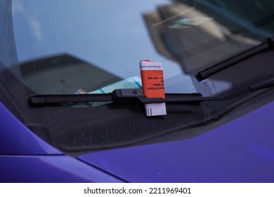 NEW YORK - SEPTEMBER 13, 2022: Illegal Parking Violation Citation On Car Windshield In New York