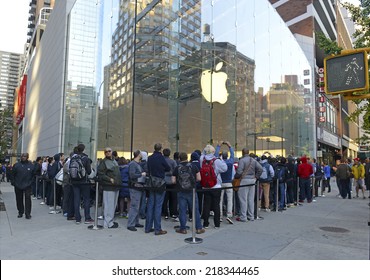 NEW YORK - SEPTEMBER 19, 2014. Thousands of loyal customers wait on long lines stretching many blocks outside the Apple Store in the Upper West Side of Manhattan for the iPhone 6 to go on sale.