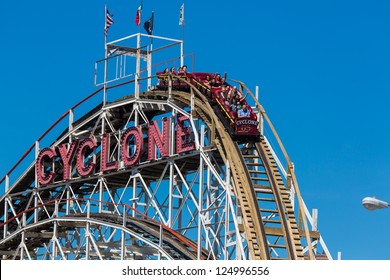 NEW YORK - SEPTEMBER 29: The Cyclone located at Luna Park in Coney Island NY on September 29 2012 It was declared NYC landmark in 1988 and placed on the National Register of Historic Places in 1991