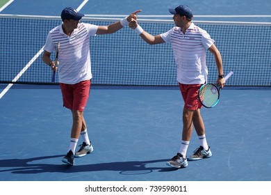 NEW YORK -SEPTEMBER 4, 2017: Grand Slam champions Mike and Bob Bryan of United states in action during US Open 2017 round 3 men's doubles match at Billie Jean King National Tennis Center in New York