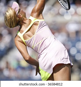 NEW York - September 5: Maria Sharapova returns a shot during 3rd round match against Melanie Oudin of USA at US Open on September 5 2009 in New York
