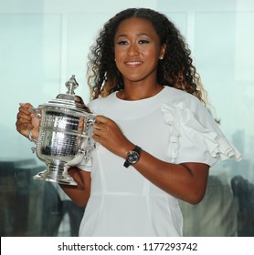 NEW YORK - SEPTEMBER 8, 2018: 2018 US Open Champion Naomi Osaka Of Japan Poses With US Open Trophy In New York