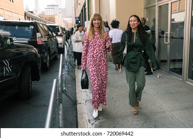 NEW YORK, NEW YORK - SEPTEMBER 9, 2017: Fashion professionals leaving a fashion runway show during New York Fashion Week 2017 outside of Skylight Studios.