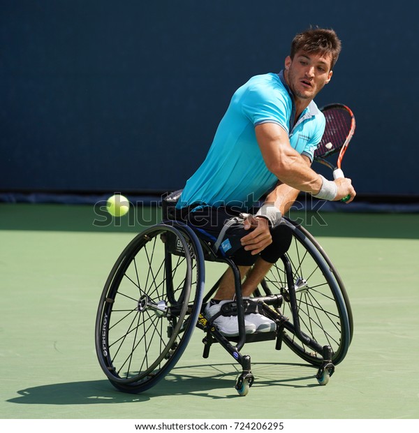 NEW YORK - SEPTEMBER 9, 2017: Argentinian\
wheelchair tennis player Gustavo Fernandez in action during US Open\
2017 Wheelchair Men\'s Singles semifinal at Billie Jean King\
National Tennis Center