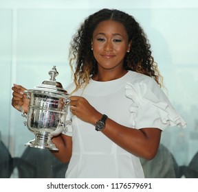 NEW YORK - SEPTEMBER 9, 2018: 2018 US Open Champion Naomi Osaka Of Japan Poses With US Open Trophy In New York