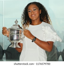 NEW YORK - SEPTEMBER 9, 2018: 2018 US Open Champion Naomi Osaka Of Japan Poses With US Open Trophy In New York