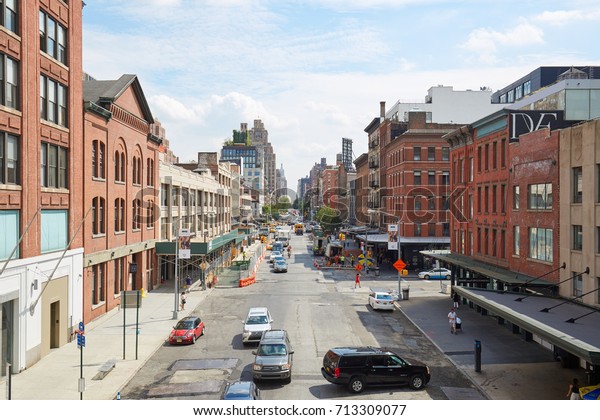 NEW YORK -\
SEPTEMBER 9: Meatpacking and Chelsea district street aerial view\
with red brick wall buildings on September 9, 2016 in New York.\
This area is near the High\
Line.