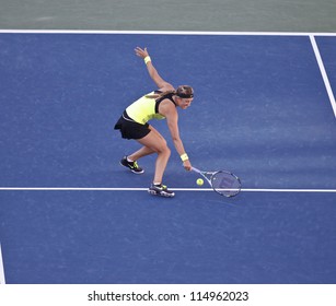 NEW YORK - SEPTEMBER 9: Victoria Azarenka of Belarus returns the ball during final against Serena Williams of USA at US Open tennis tournament on Sep 9, 2012 in New York City - Shutterstock ID 114962023